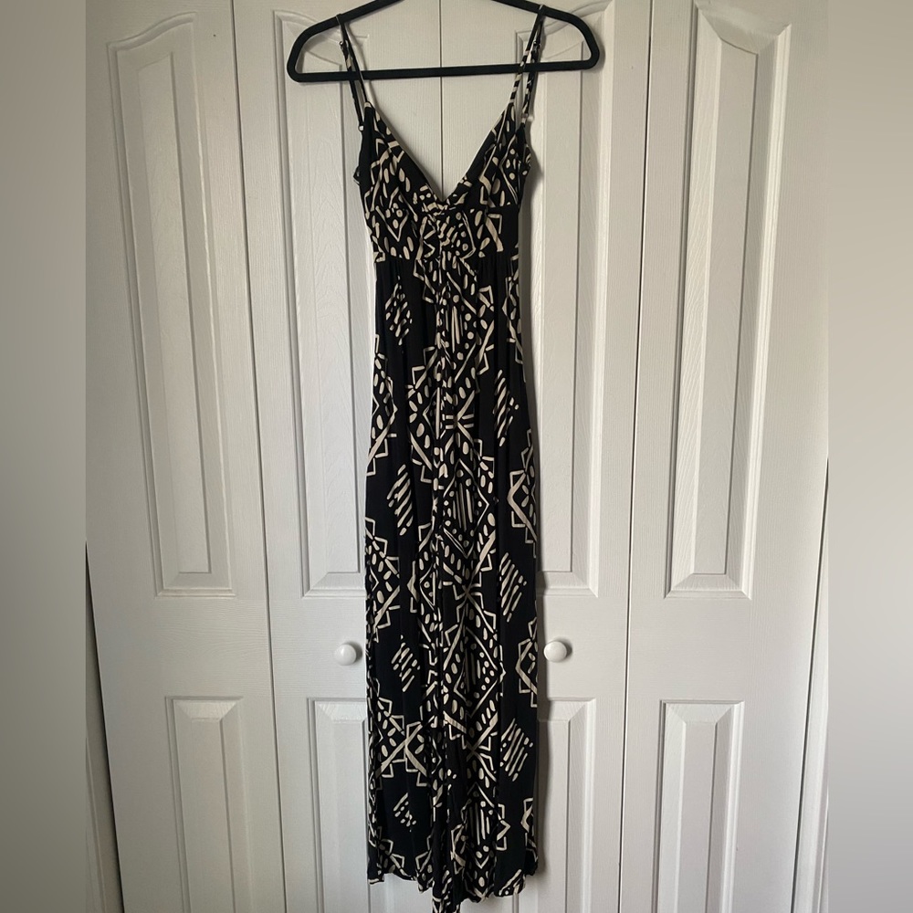 ADJUSTABLE STRAP-WIDE LEG- JUMPER-TIE BACK-BLACK AND WHITE PATTERN-XS